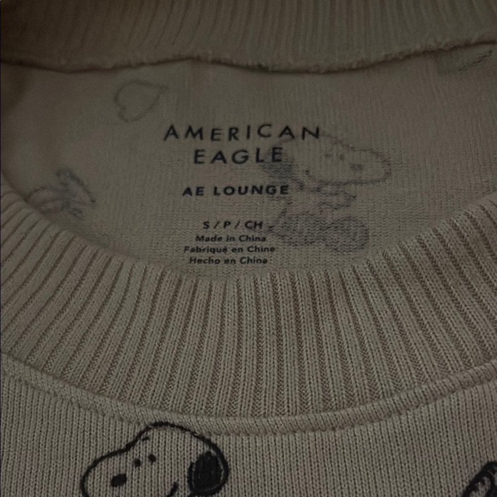 American Eagle Cream Snoopy Sweater
